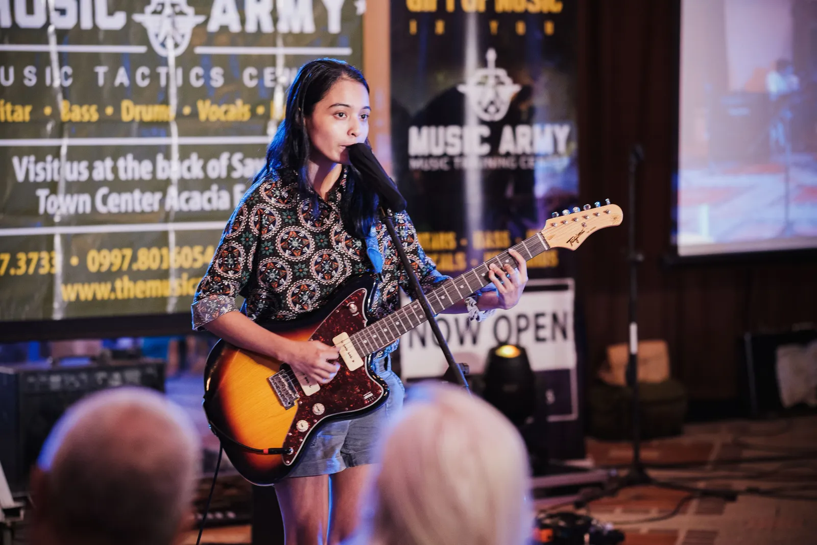 Student performing at a talent show